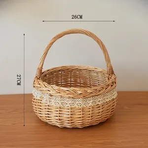Detail view of woven wicker picnic basket showing floral lace trim and size 26x27cm