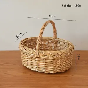 Close-up of handmade wicker storage basket showing 23cm length and 159g weight