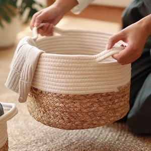 Two-tone woven cotton rope and seagrass storage basket with handles for home organization