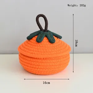 Detailed view of pumpkin-shaped cotton rope basket with dimensions 18cm by 16cm