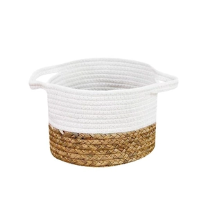 Minimalist woven cotton rope and natural grass storage basket with dual handles