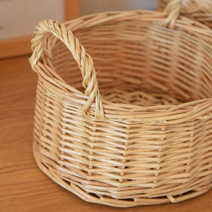 Macro detail of hand-woven wicker storage basket handle with natural fiber texture