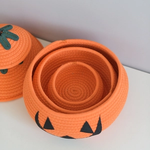 Nesting pumpkin cotton rope baskets with Jack-o'-lantern face and lid detail