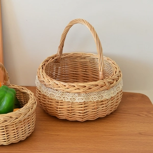 Close-up of handmade wicker basket with decorative beige lace trim and natural texture