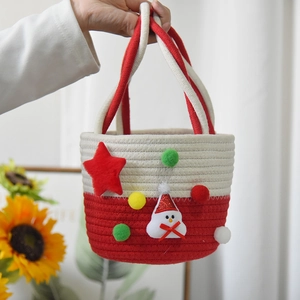 Handmade woven cotton cherry tote bag with festive snowman and red plush star decorations