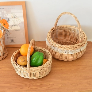 Detail of woven wicker baskets with white lace trim and rustic handmade willow texture