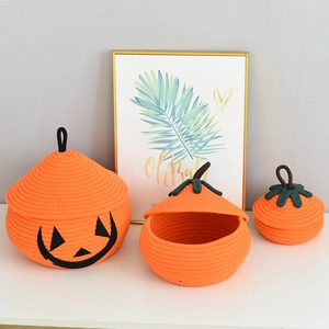 Detailed view of pumpkin-shaped cotton rope woven storage baskets for Halloween decor