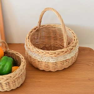 Close-up of natural wicker storage basket featuring delicate white lace trim and sturdy handle