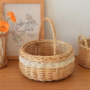 Close-up of hand-woven wicker basket with white lace trim and single handle for picnic