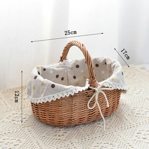 Detail of hand-woven wicker basket featuring retro polka dot lining and white lace trim