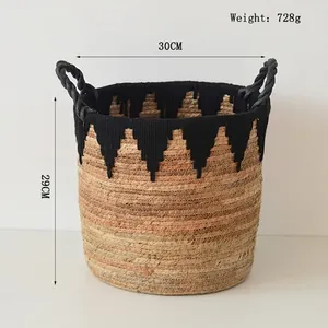 Detail of hand-woven storage basket with black tassels and 728g weight specification