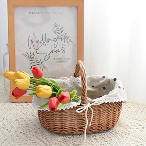 Detail of woven wicker basket with polka dot fabric lining and elegant lace trim