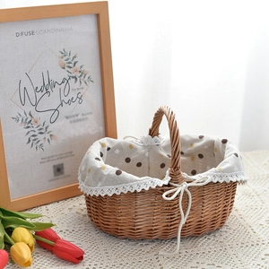 Close-up of hand-woven wicker basket with polka dot lining and elegant lace trim