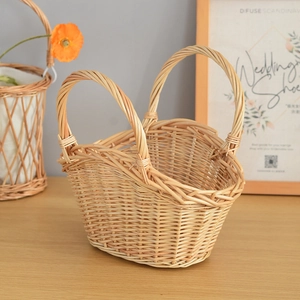 Detailed view of hand-woven wicker storage basket with sturdy double handles and rustic texture