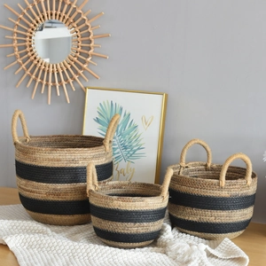 Three-piece woven seagrass storage baskets with black stripes and sturdy rope handles