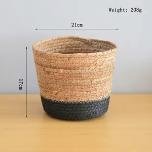 Detail view of woven storage basket with 21cm diameter and 17cm height dimensions