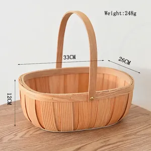 Detail of hand-woven wood picnic basket showing dimensions 33x26x12cm and 248g weight