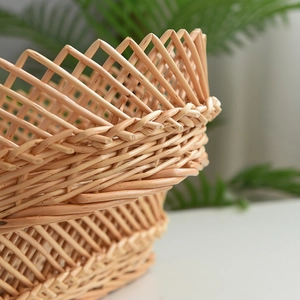 Close-up of natural wicker storage basket showing intricate handmade weaving details