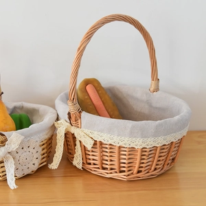 Handwoven wicker gift basket with linen lining and lace trim for picnic or home storage