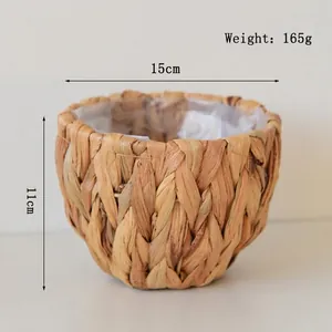 Detail view of woven plant basket with waterproof plastic liner showing dimensions and weight