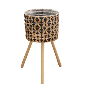 Handwoven rattan planter with tripod wooden legs and geometric diamond pattern