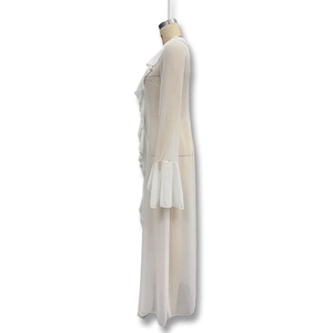 Detailed side view of a white lace-up cover-up with tiered ruffles and flared sleeves