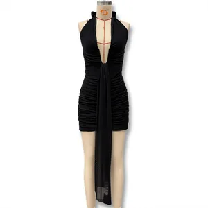 Detail of black halter deep V dress with ruching and long mesh streamers
