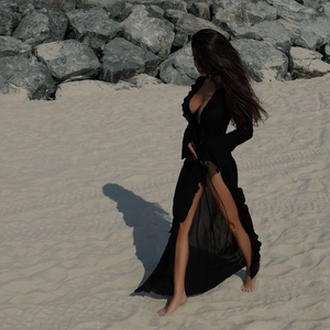Sexy black long sleeve beach cover up with ruffle details and high slit for summer vacation