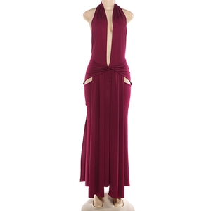 Detail of burgundy halter maxi dress with deep V-neckline and waist cut-out details
