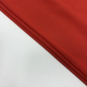 Close-up detail of red breathable mesh fabric texture for sexy backless leopard dress