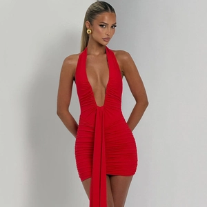 Detail of red deep V-neck halter mini dress with ruched fabric and decorative ribbons