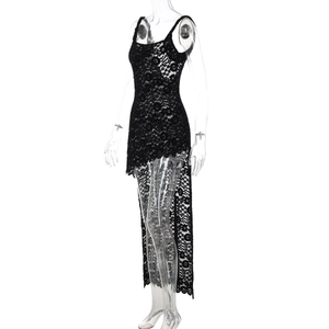 Détail de robe en dentelle noire avec ourlet crochet asymétrique et motifs floraux