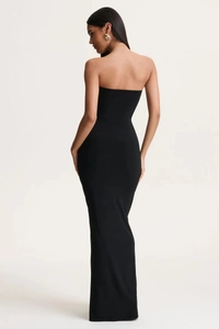 Elegant back view of black strapless maxi dress with a sleek slim fit silhouette