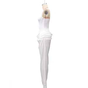 Detail view of the side profile showing ruched draping on white bodycon dress