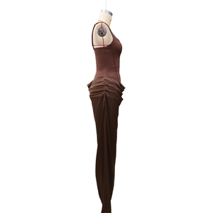 Detail view of the chocolate brown ruched side seams on this elegant square neck dress