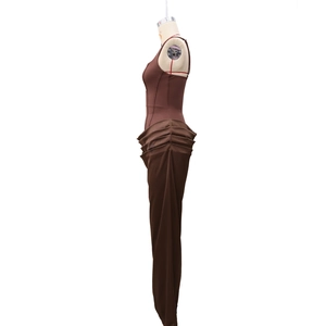 Detail of waist drapery and side stitching on brown square neck bodycon dress