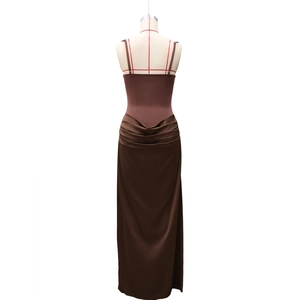 Detail view of the back of a slim-fit dark brown sleeveless dress with ruched texture