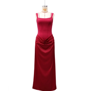 Macro detail of wine red square neck dress featuring gathered waist pleats and slim fit