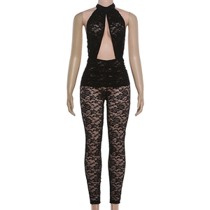 Detail of rose floral lace pattern on black halter neck cutout jumpsuit for women