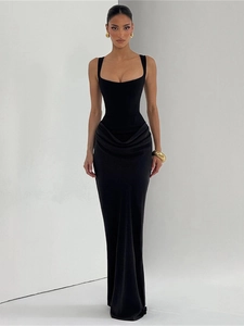 Detail of elegant square neck black maxi dress with sophisticated draped side gathering