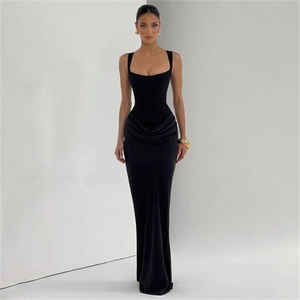 Detailed view of the elegant black bodycon dress featuring sophisticated waist draping detail