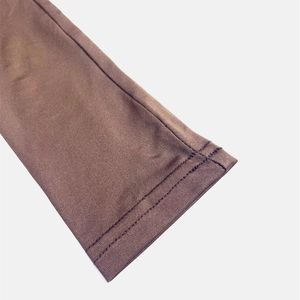 Detailed view of coffee brown knit sleeve with professional double-needle coverstitch hem