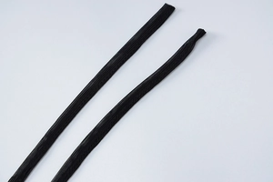 Close-up of black flat mesh woven drawstring for hoodies and athletic wear