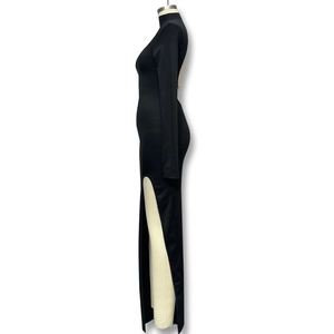 Detail view of backless design and high side slit on elegant black slim evening dress