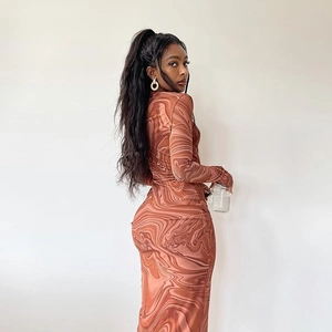 Chic long sleeve bodycon dress with brown marble swirl print and elegant high neckline