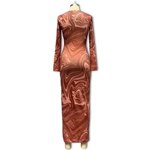 Detailed back view of a bodycon maxi dress featuring brown and beige marble print patterns