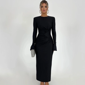 Detailed view of waist pleats and cinched cross-belt design on a slim fit black dress