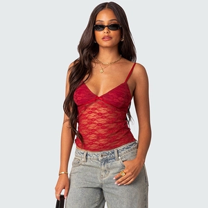 Close-up of red floral lace camisole with delicate bow detail and slim v-neck straps