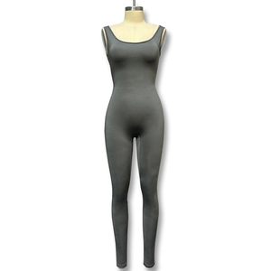 Detail view of charcoal grey sleeveless bodysuit featuring high-stretch knit fabric and U-neck