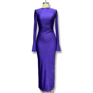 Detailed view of the purple long sleeve dress featuring elegant waist pleats and flared cuffs